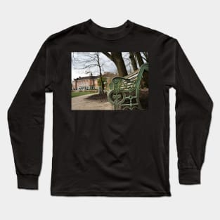 A bench in the park with a background of  South Hill Park Arts Centre, Bracknell, England, UK Long Sleeve T-Shirt